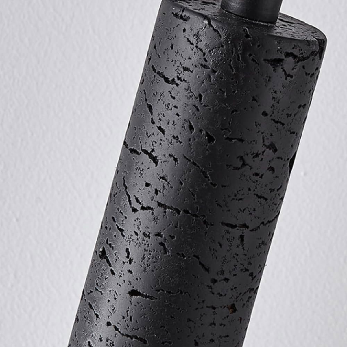 Aurevia Pendant Light Black Travertine + Black - close-up of black travertine texture
