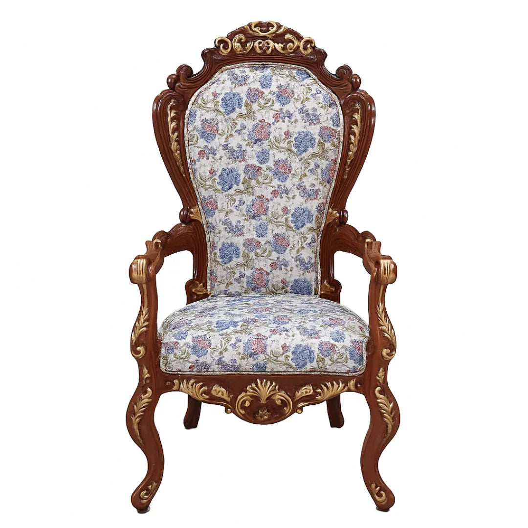 Decorative chair with floral patterned fabric on a white background
