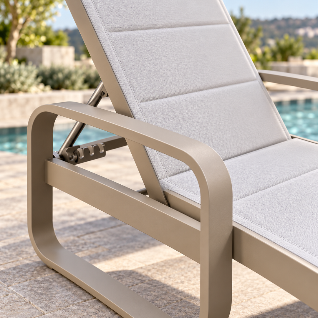 Close-up of the Positano sun lounger curved loop arm, quilted padded sling and backrest adjustment ratchet