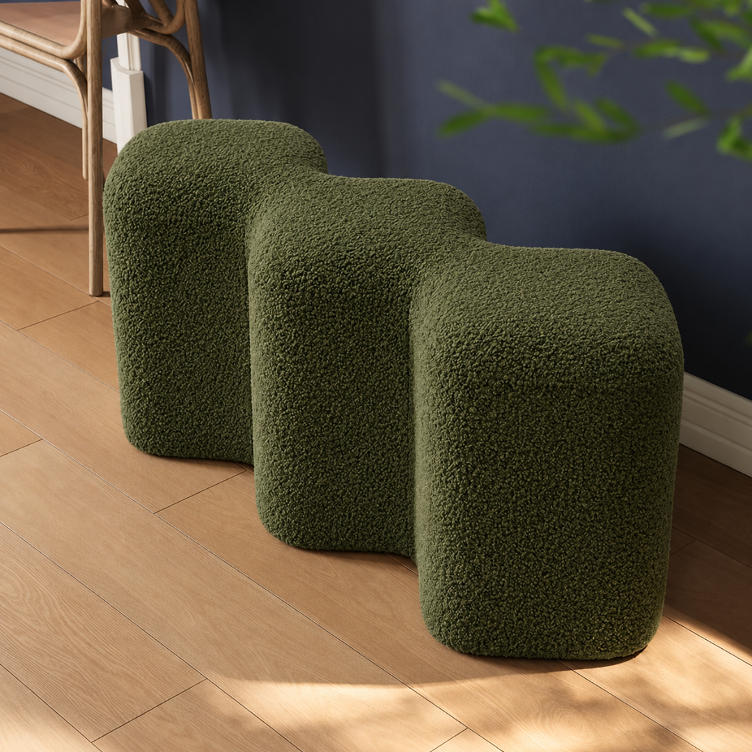Wooden Twist Cloud olive green wavy boucle bench ottoman on a wooden floor