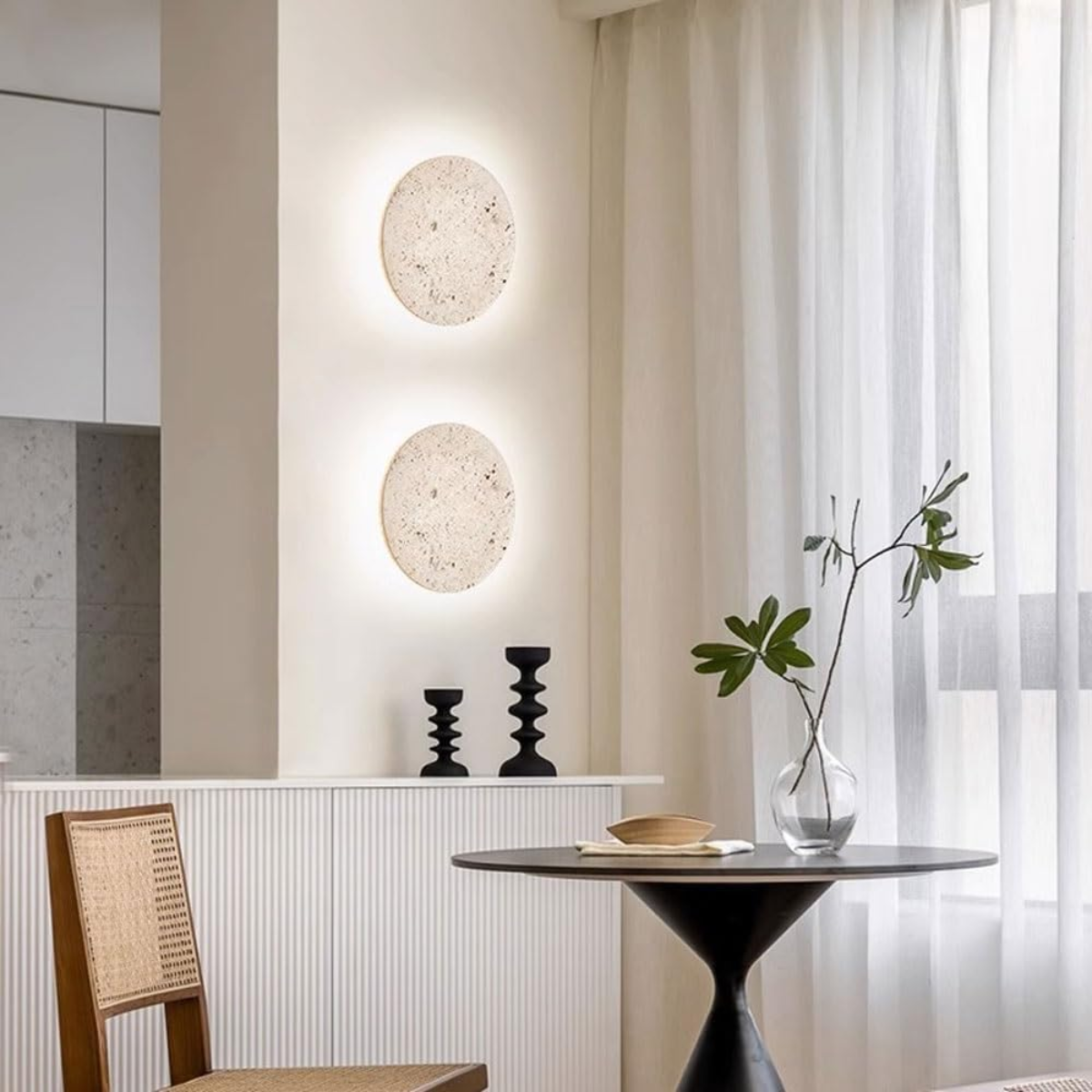 Lunaro Travertine Round Wall Sconce - lifestyle, two sconces stacked above a console