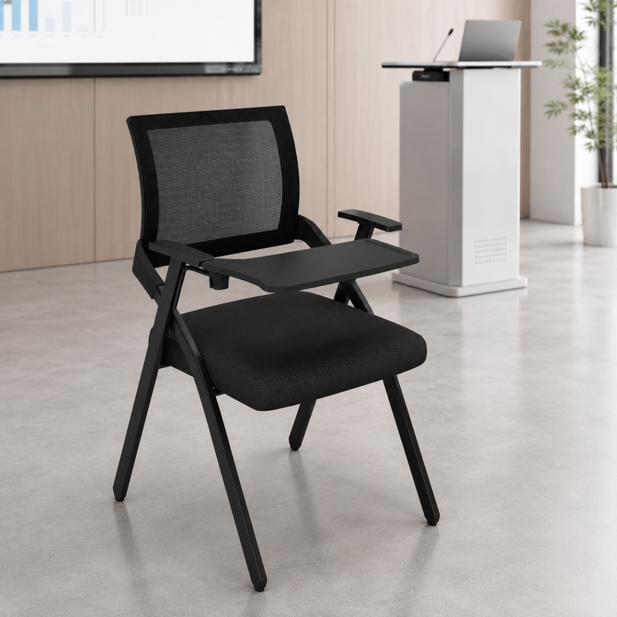 Wooden Twist stackable training chair with writing tablet in a conference room - lifestyle view