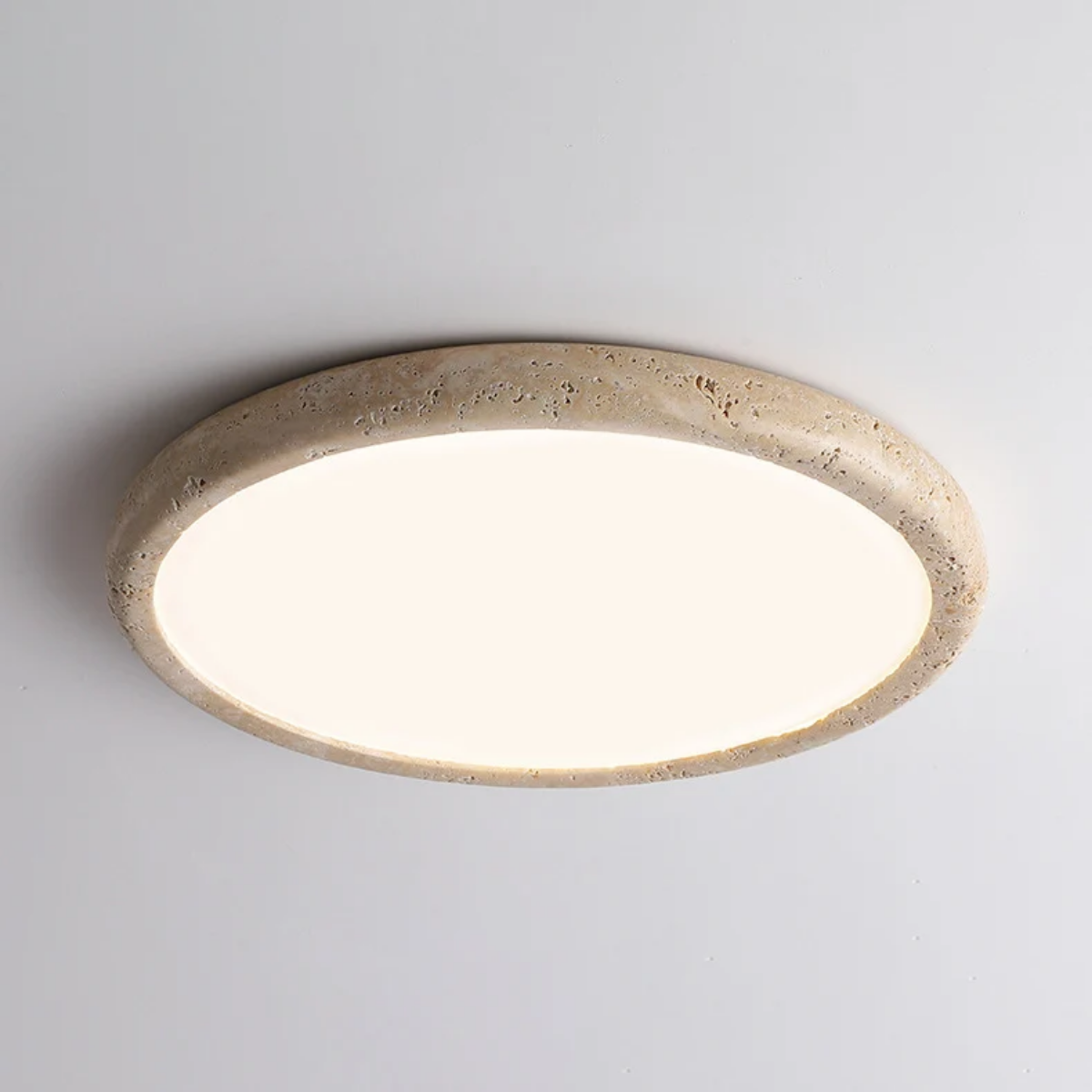 Zenora Travertine LED Ceiling Light angled product view showing the travertine stone ring