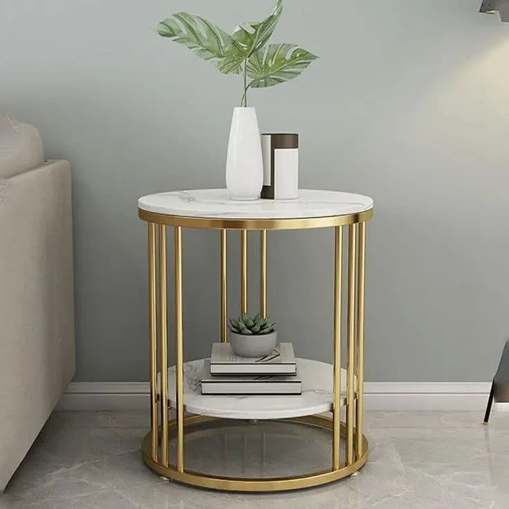 A sleek 1-tier round end table in golden wrought iron