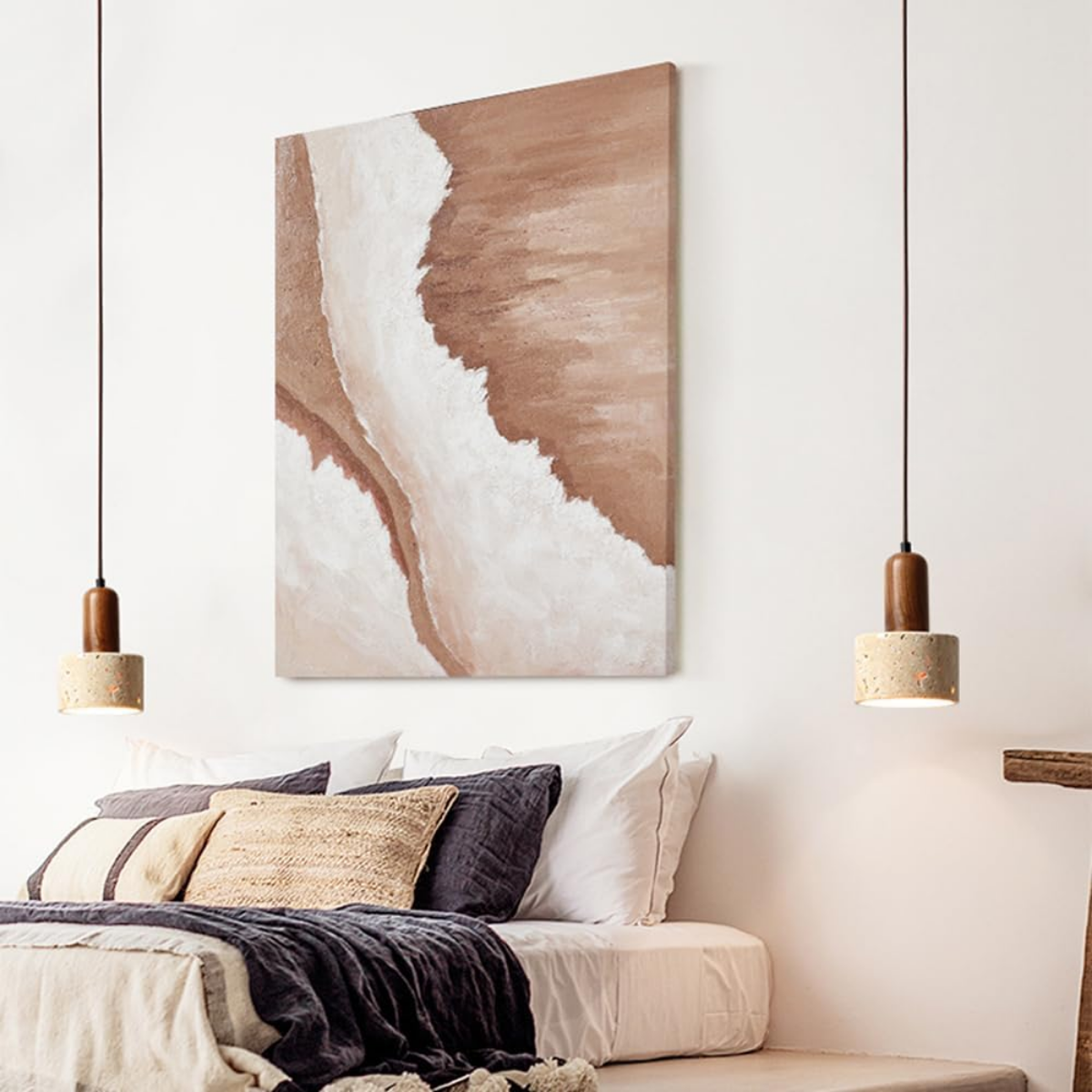 Aurelia Travertine Cylinder Pendant Light hanging beside a bed with a dark wood side table