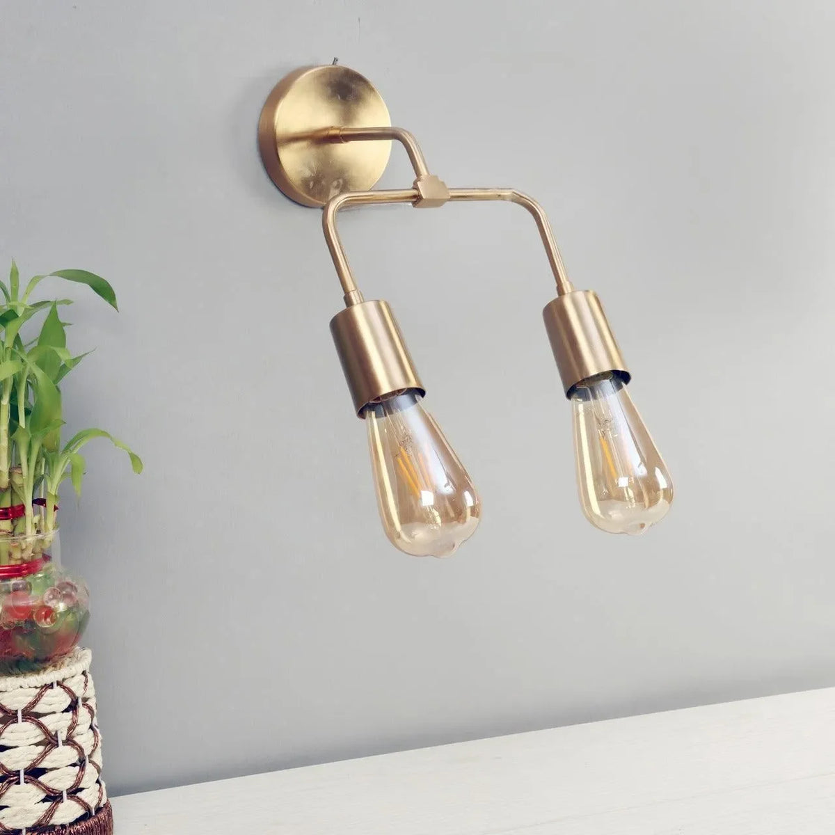 A Dual Wall Light with Artsy Gold Design