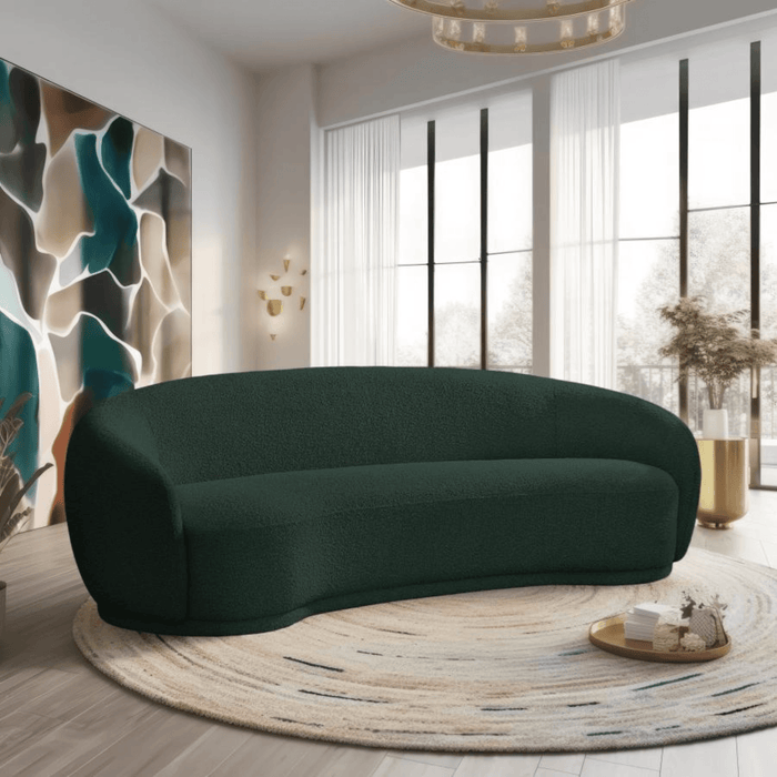 Rich green upholstered sofa