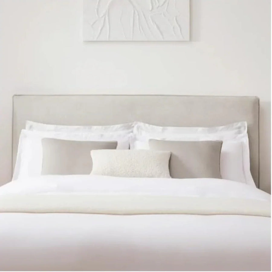 A tufted headboard built for lounging
