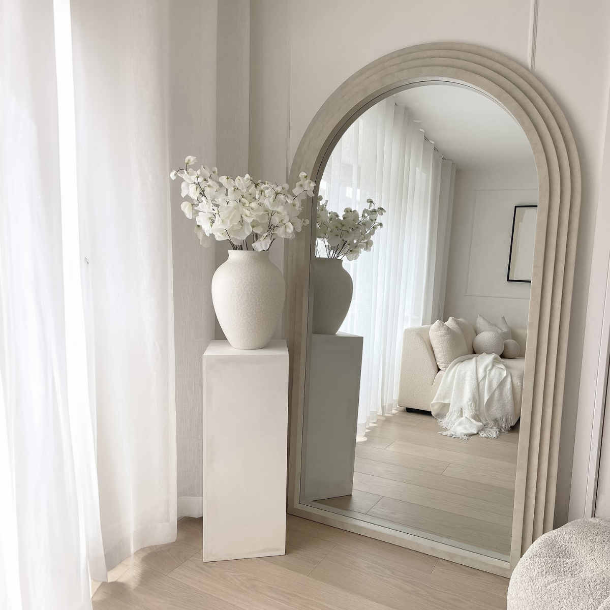Lunara Solid Wood Arch Floor Mirror - lifestyle view against neutral wall