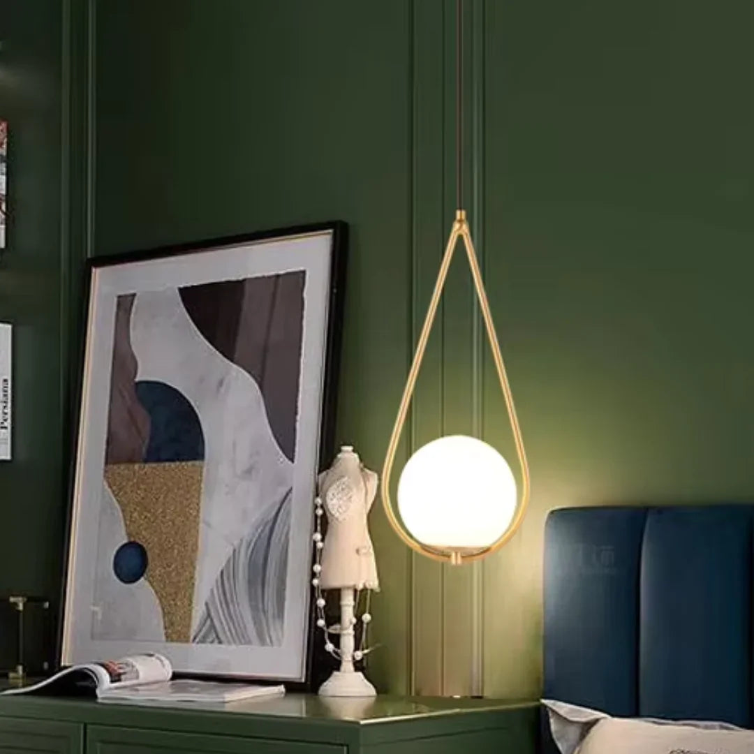 A Teardrop Silhouette in Gold and White