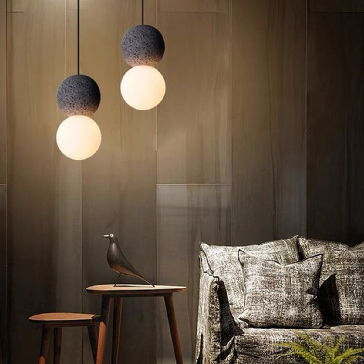 lifestyle two pendants above a wooden side table beside a sofa