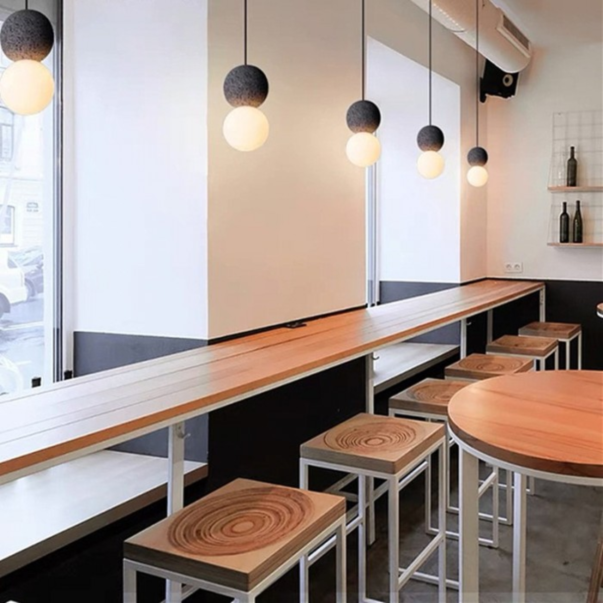 lifestyle pendants above a cafe bar counter