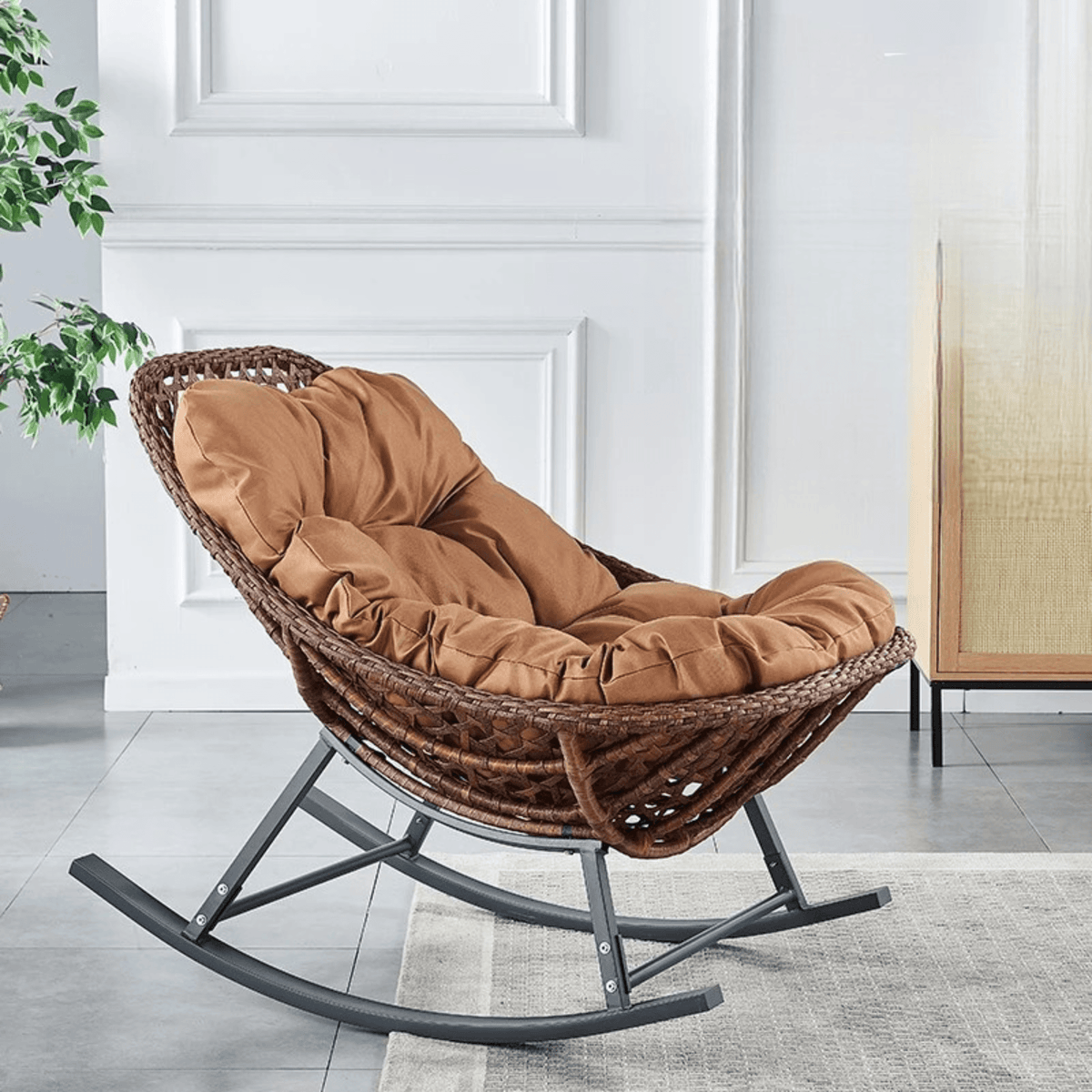 Stylish outdoor rocking chair made of rattan and iron for UAE gardens