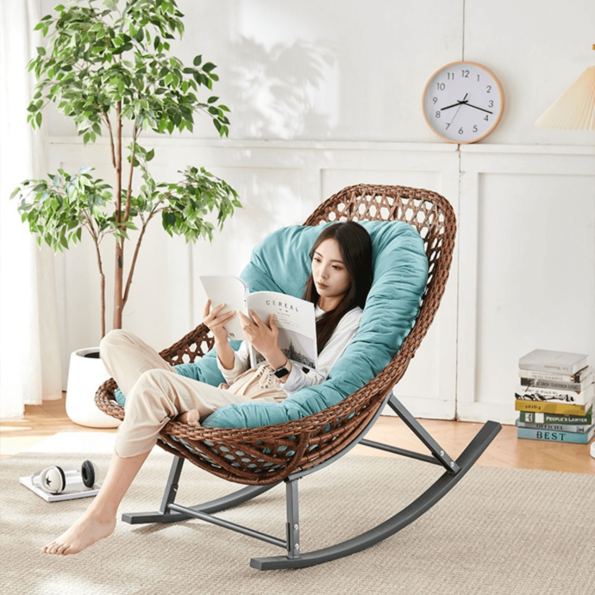 Elegant rattan rocking chair with iron legs for outdoor relaxation