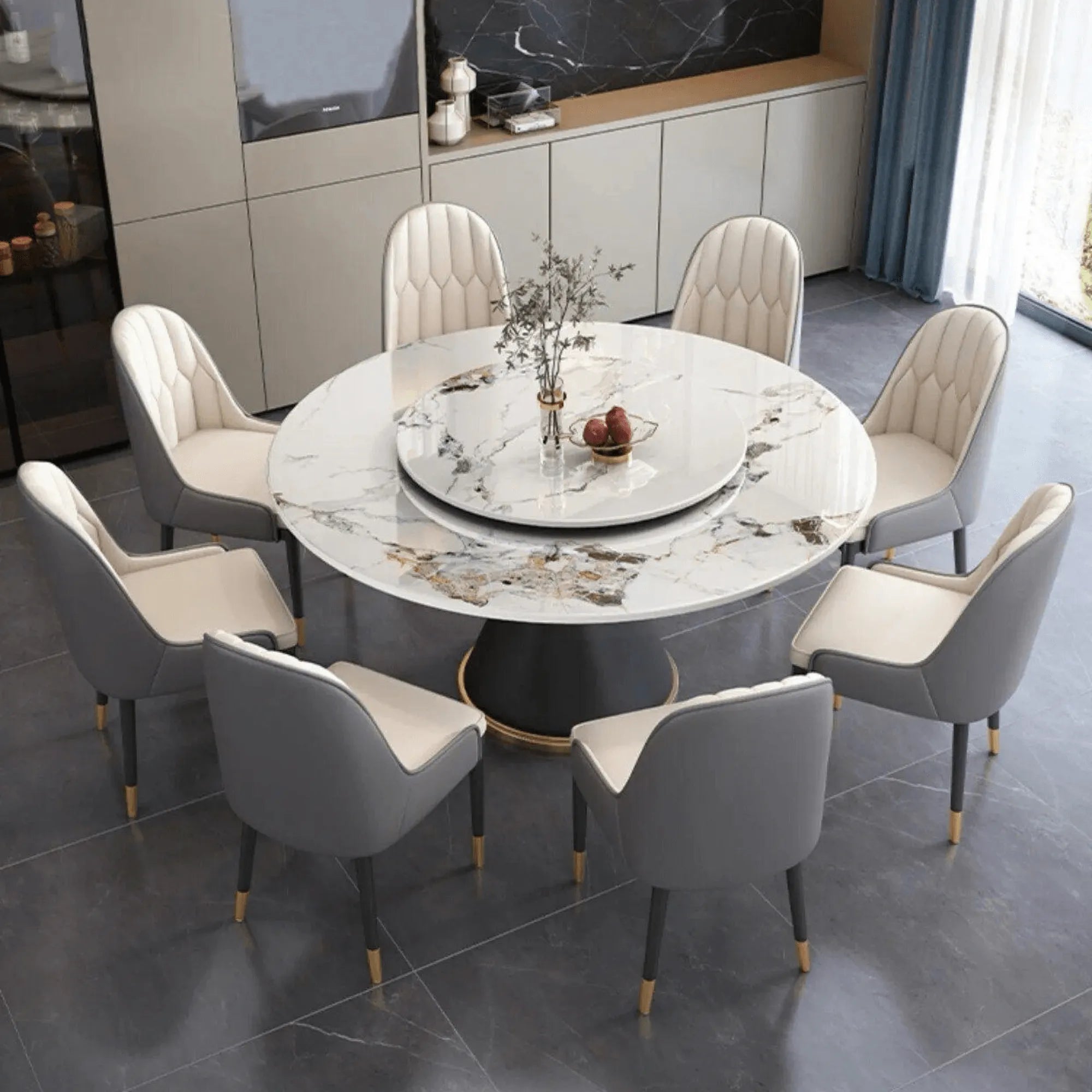 Elegant round dining table with a carbon steel base in a modern setting