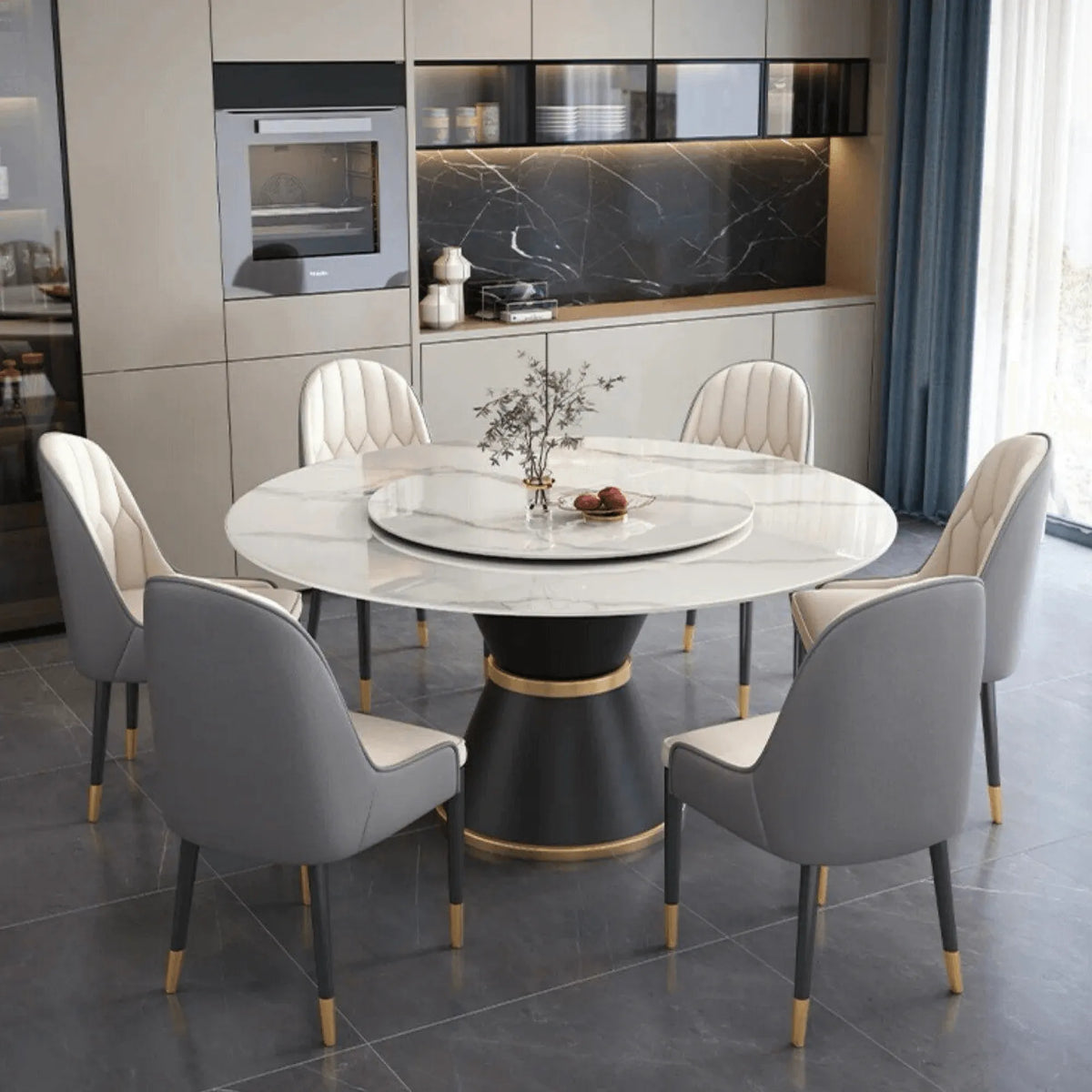 Round modern dining table with dual rotatable top and rock slab surface