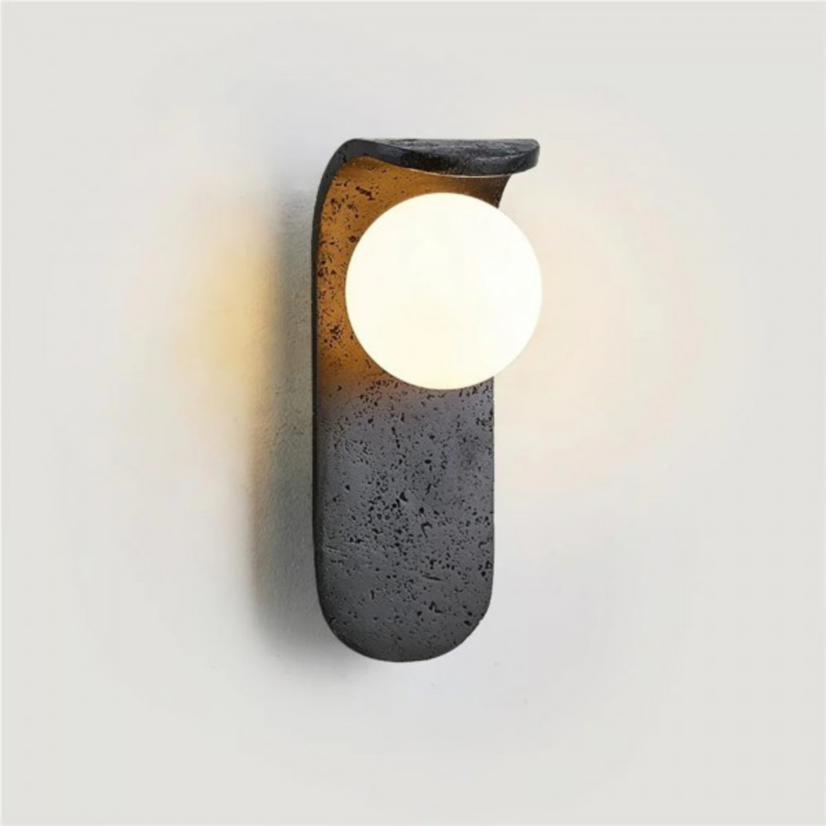 Skatera Travertine Wall Lamp angled product view showing skateboard-inspired silhouette