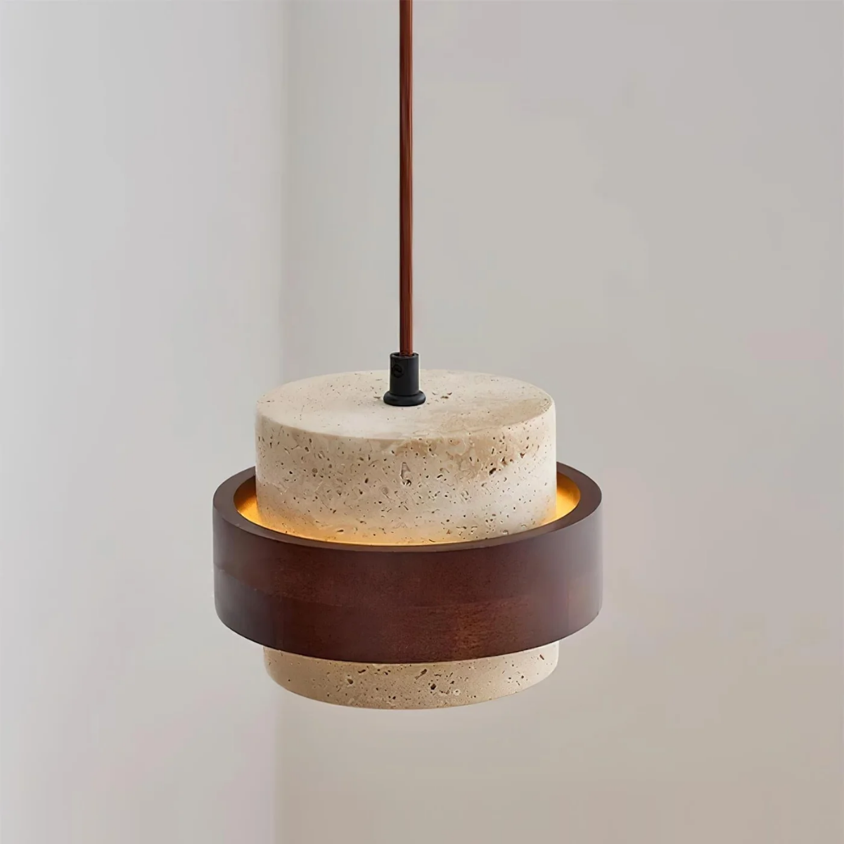straight-on close-up of travertine and walnut wood shade on gray background