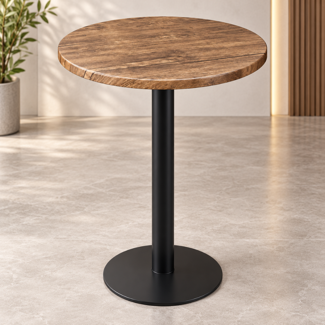 Wooden Twist Vintora Round Bar Table – studio view of wood-look fiber top and black metal pedestal