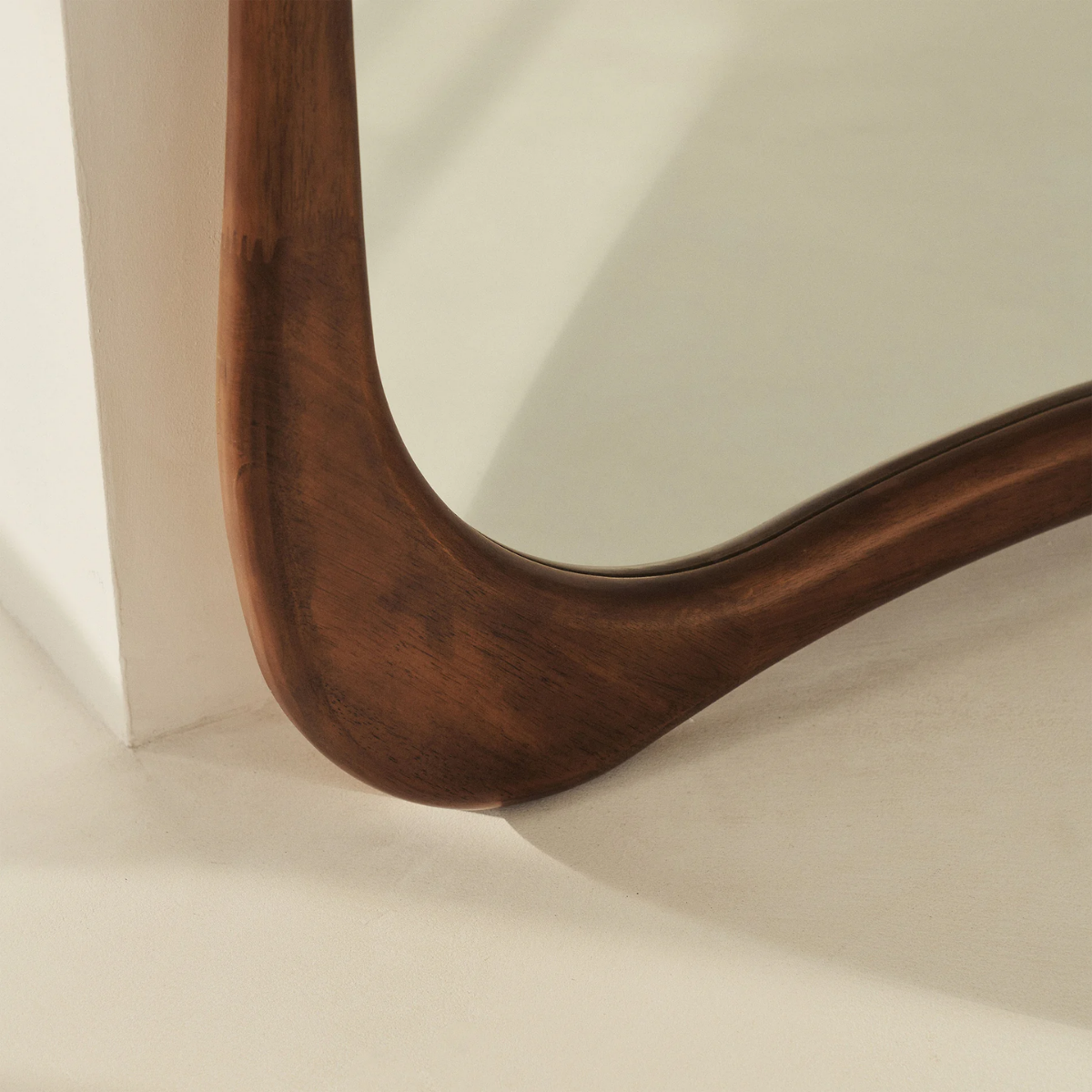 Wavy Solid Wood Floor Mirror Walnut Finish - close-up of organic wavy frame edge
