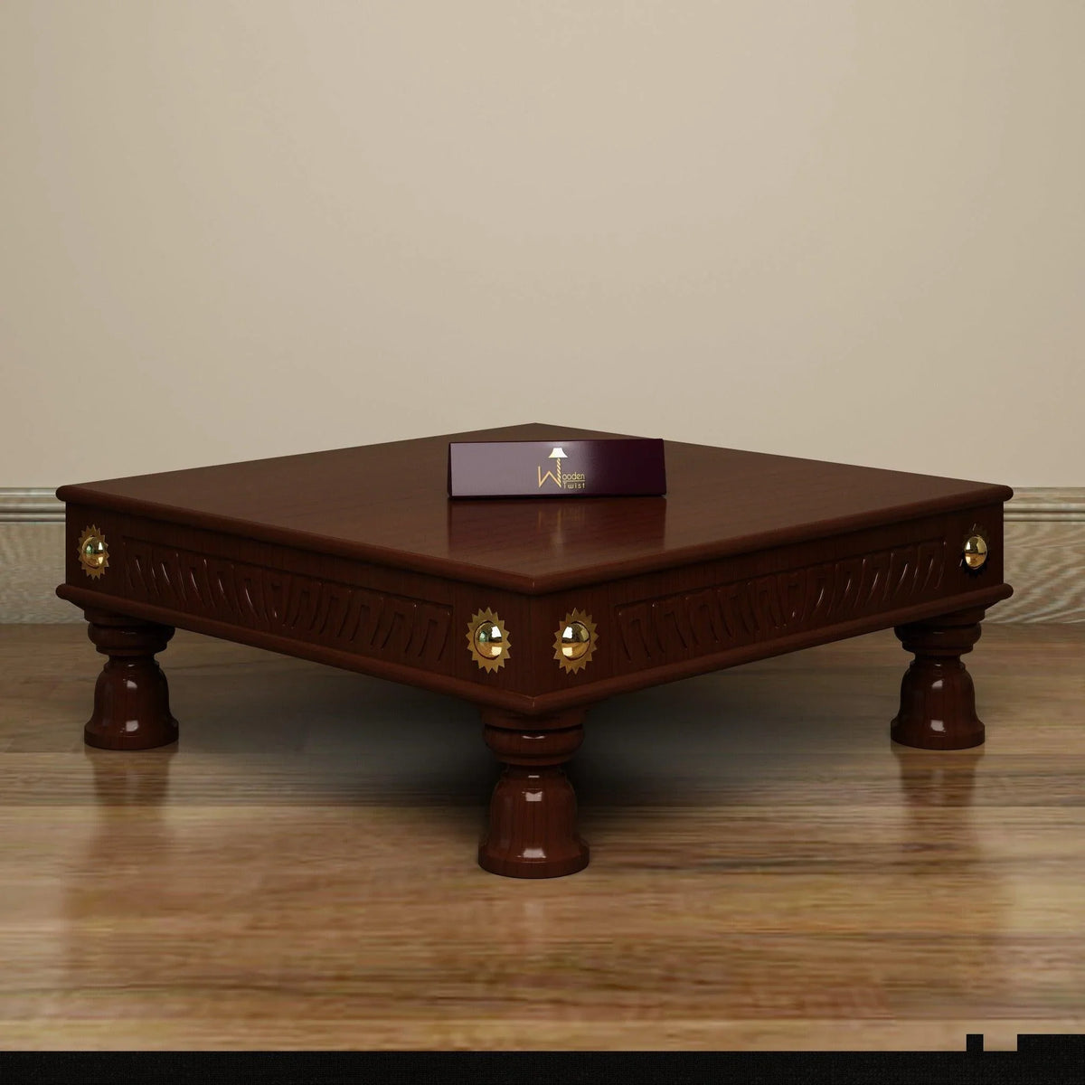 A hand-carved teak chowki with traditional charm