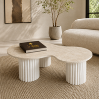 Wooden Twist Aurelia Travertine Coffee Table - lifestyle living room view