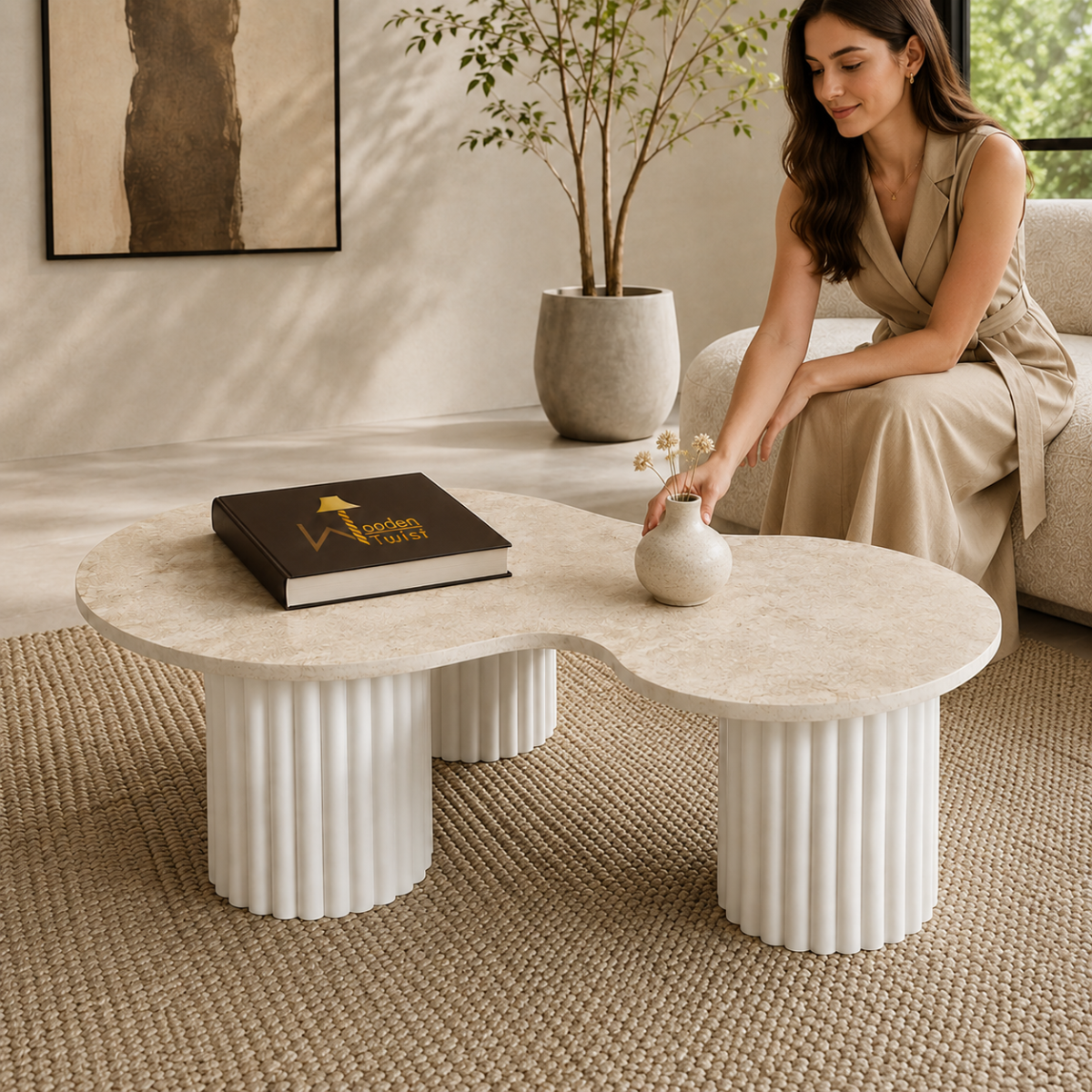 Wooden Twist Aurelia Travertine Coffee Table - lifestyle with model