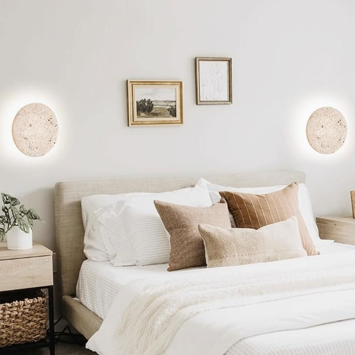 Lunaro Travertine Round Wall Sconce - lifestyle, two sconces flanking a bed headboard