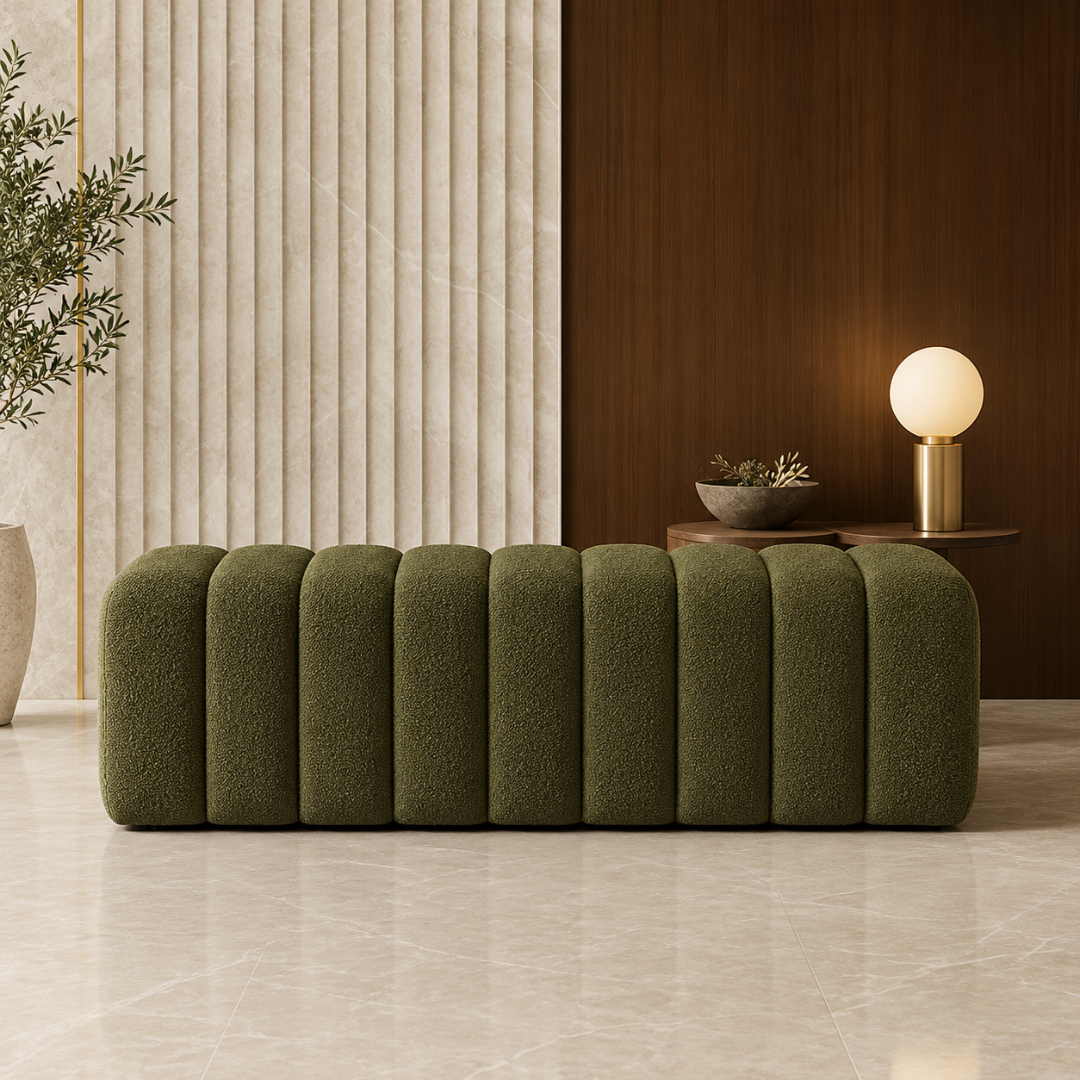 Front view of the Sage channel-tufted boucle bench against a ribbed wall