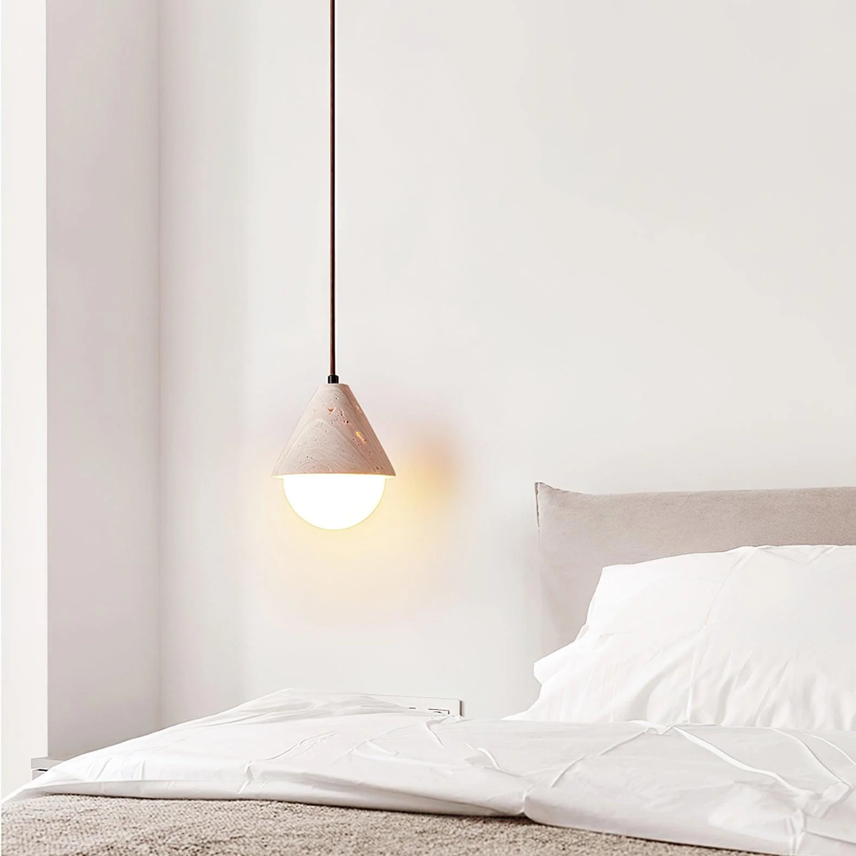 lifestyle above a bed beside a nightstand