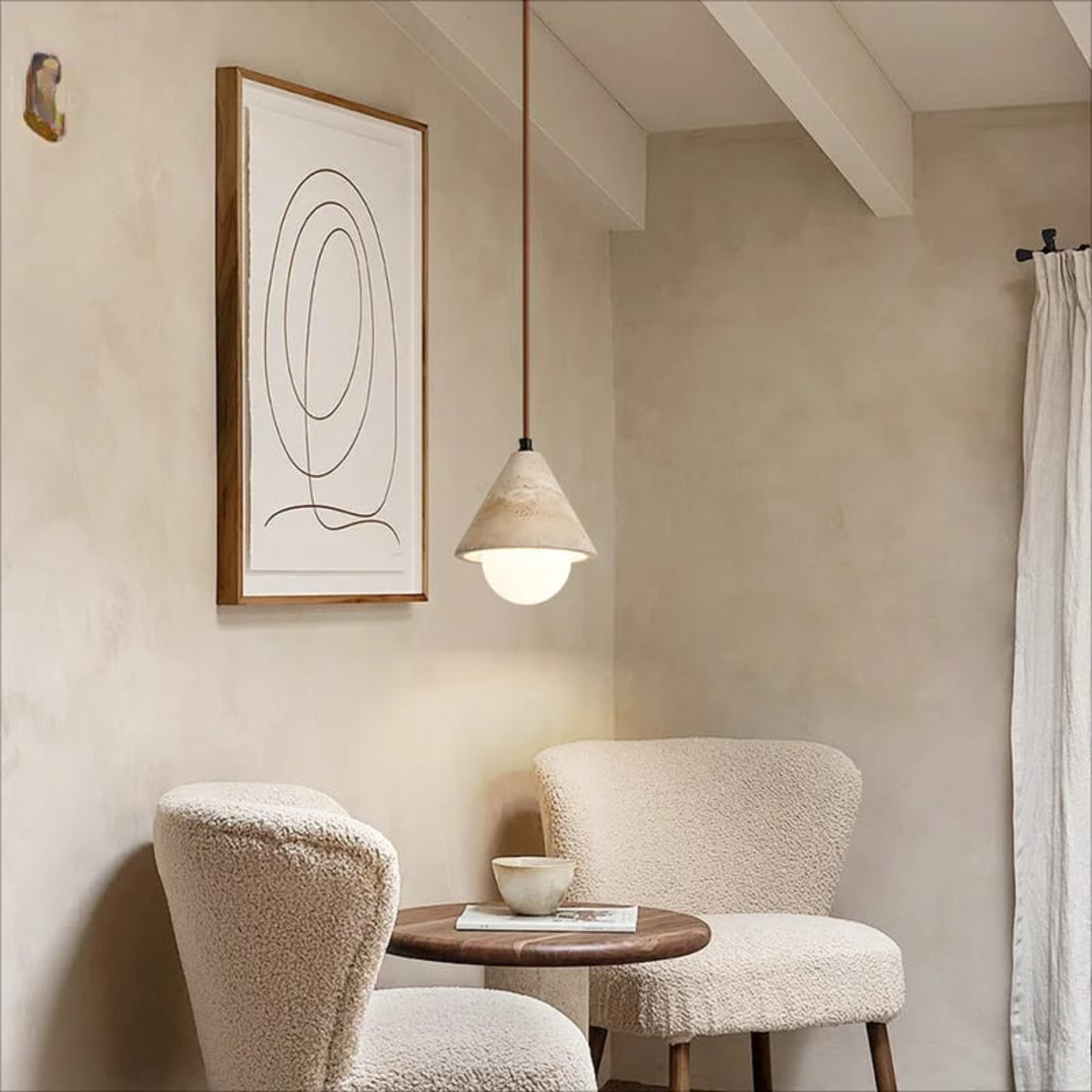lifestyle above a café lounge side table beside armchairs