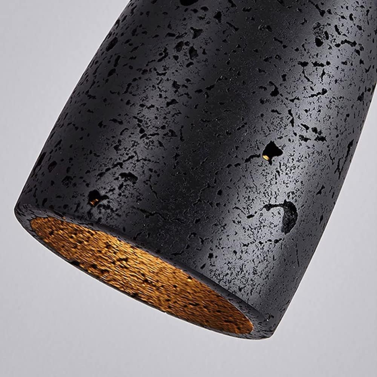 Vellora Travertine Drop Pendant Light Black - close-up of shade texture and underside glow