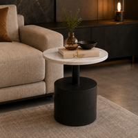 Wooden Twist Velora Round Sintered Stone End Table, living room lifestyle view beside sofa