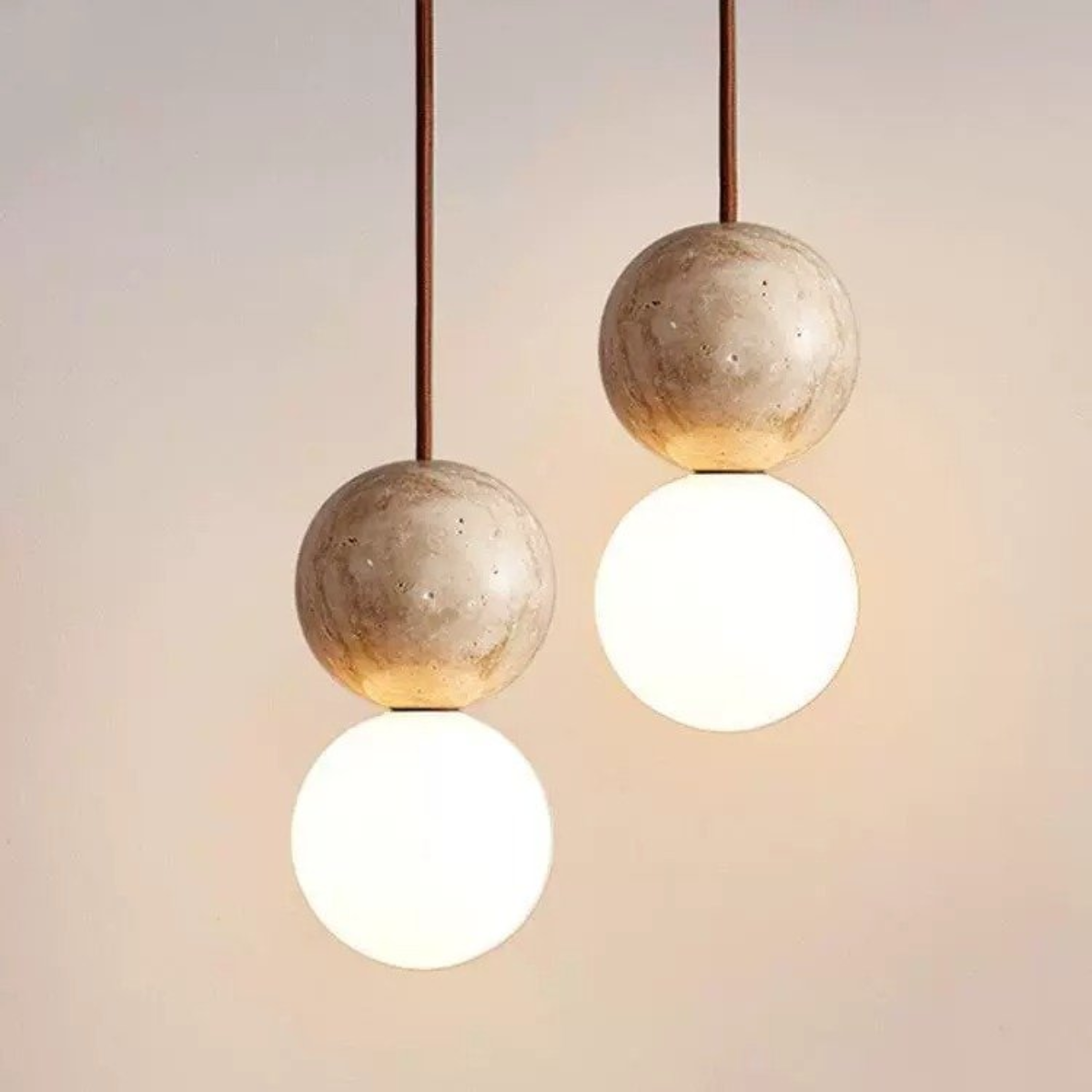 Mia Orb Pendant Light Natural - two pendants at different heights, beige background