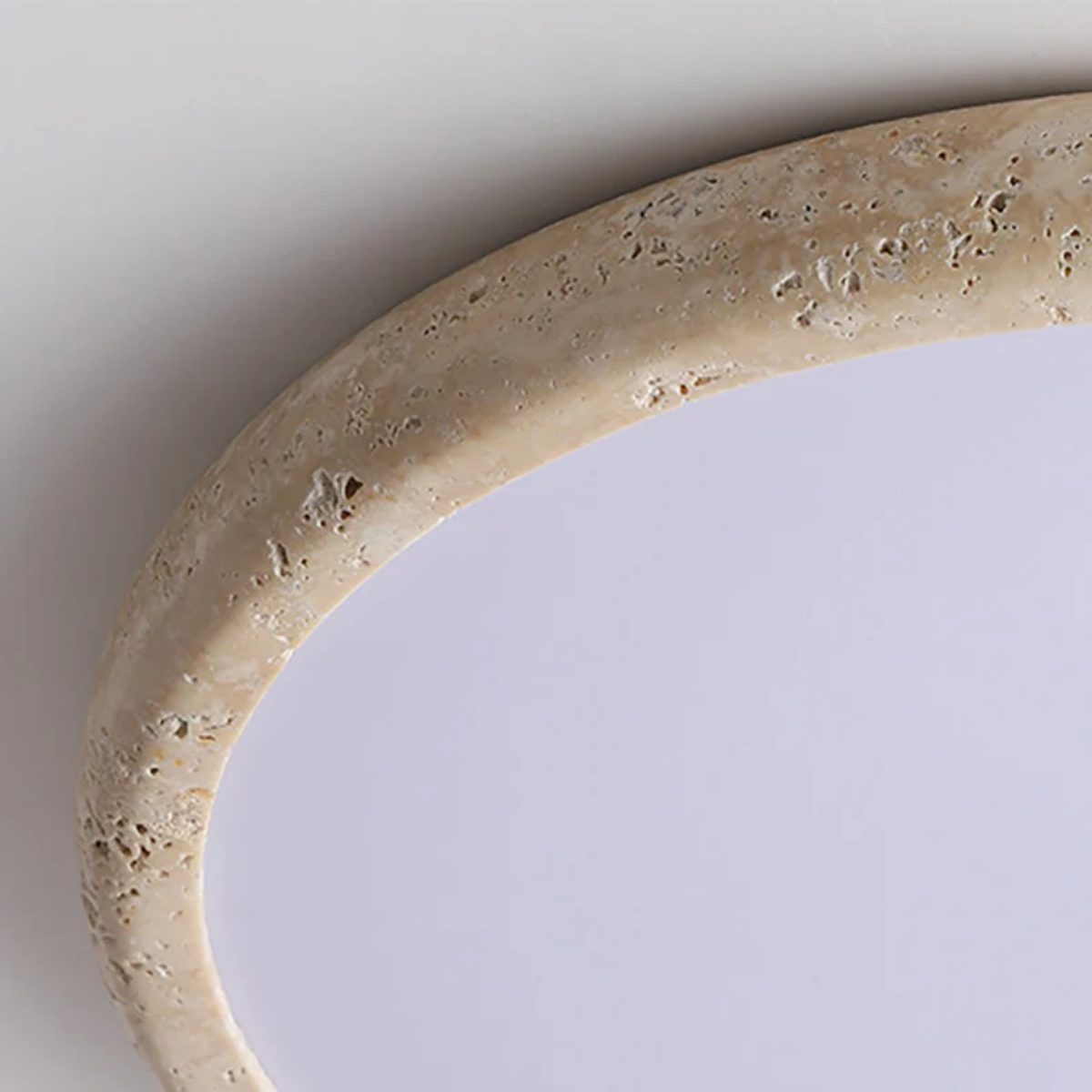 Macro texture detail of the travertine stone ring on Zenora LED Ceiling Light