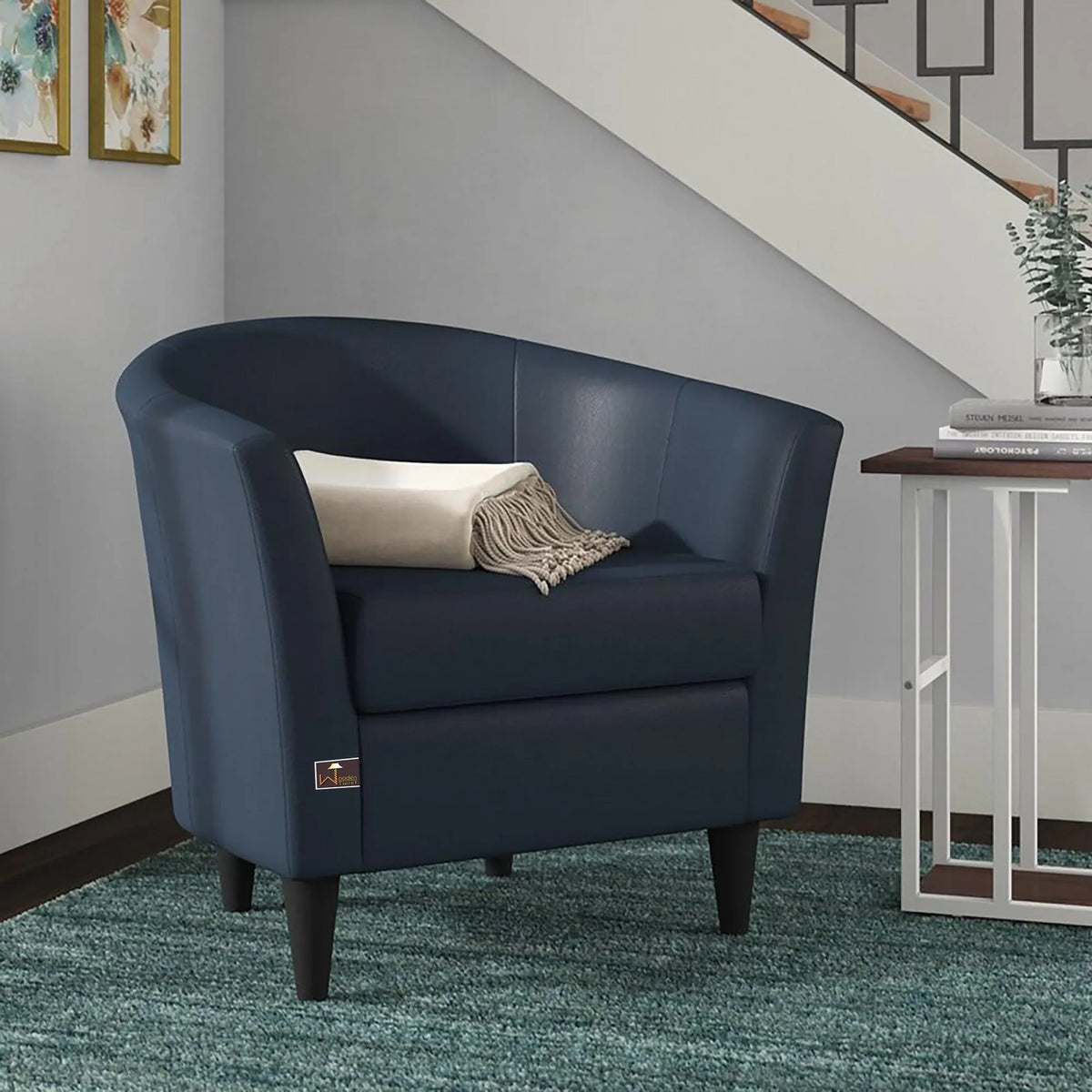 A Wide Barrel Arm Chair in Rich Peacock Blue