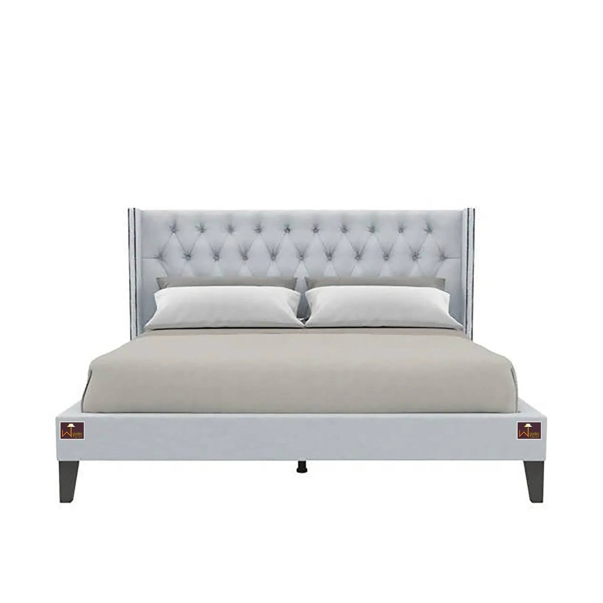 A Statement Wingback Bed in Light Grey