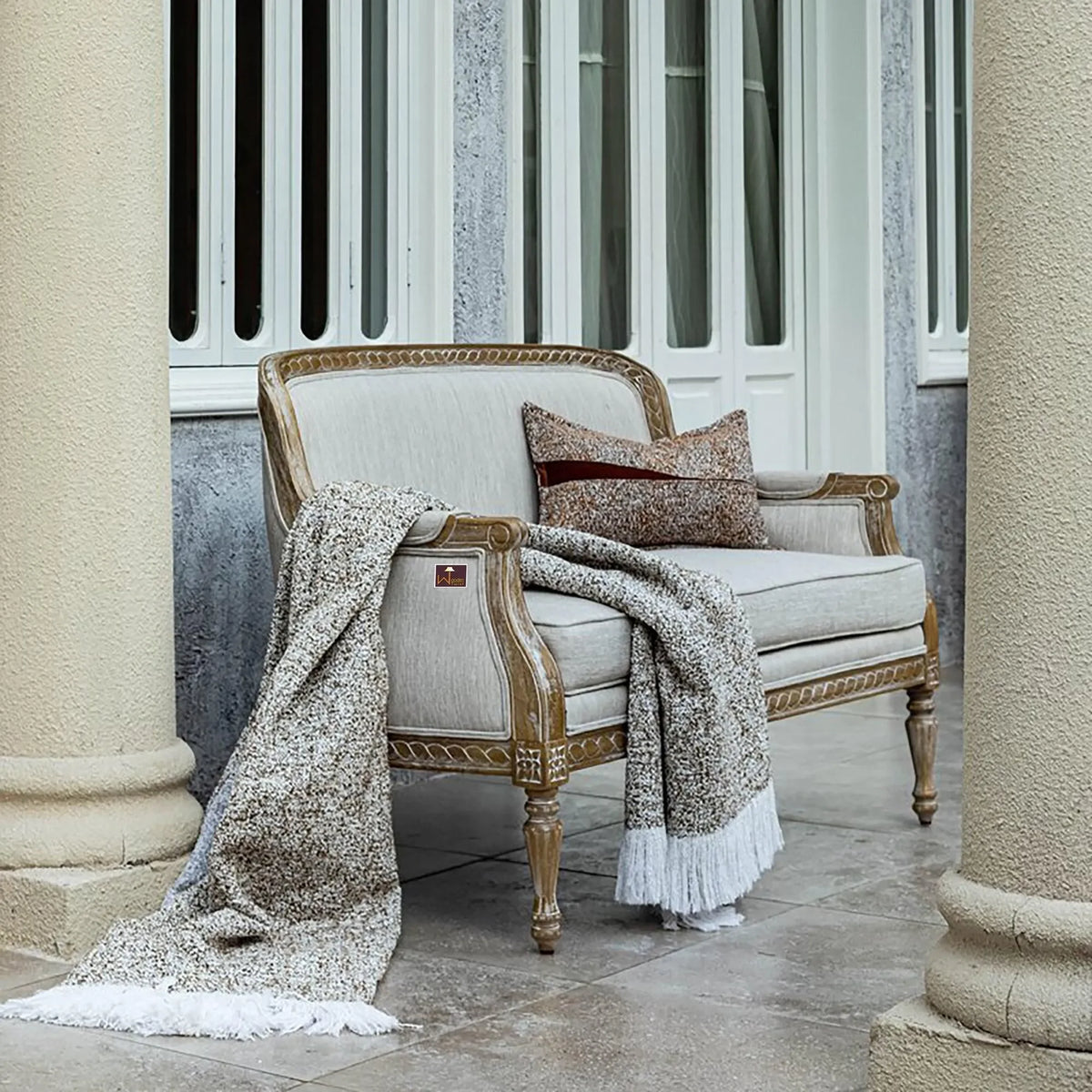 A Hand Carved Loveseat Rooted in Tradition